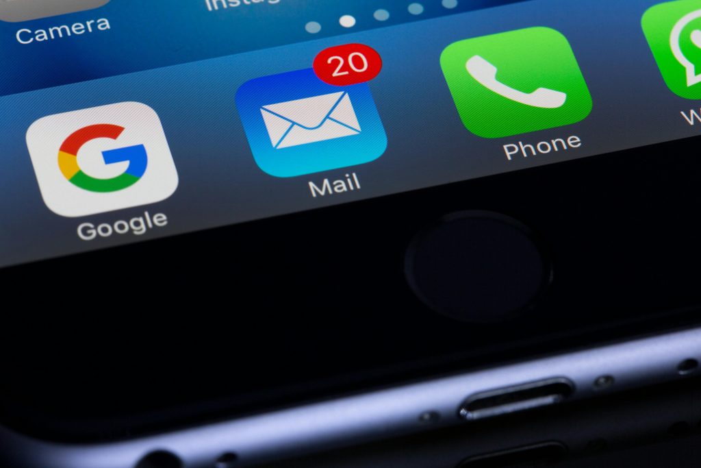 pexels photo 193003 193003 A close-up photo of a smartphone displaying popular apps like Google and Mail.